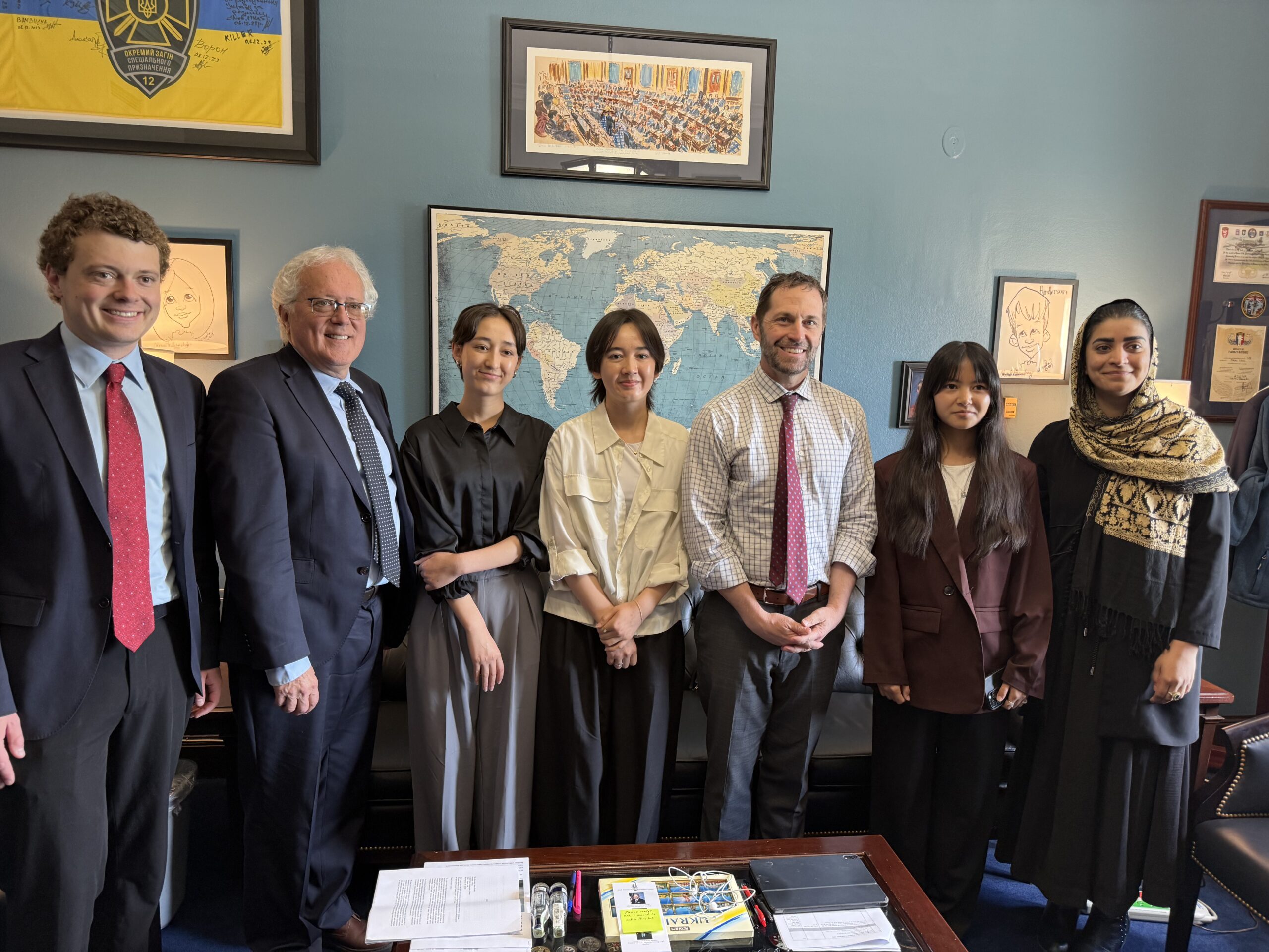 ASRF students standing with Representative Jason Crow in his congressional office