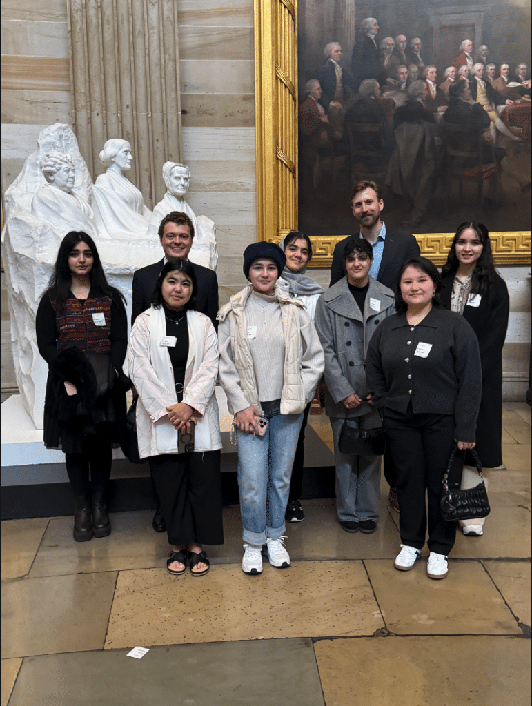 ASRF students standing at the Women’s Suffrage monument in the Capitol Rotunda