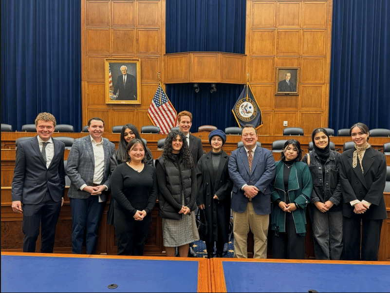 ASRF students and staff seated around a table with bipartisan Foreign Affairs Committee staff