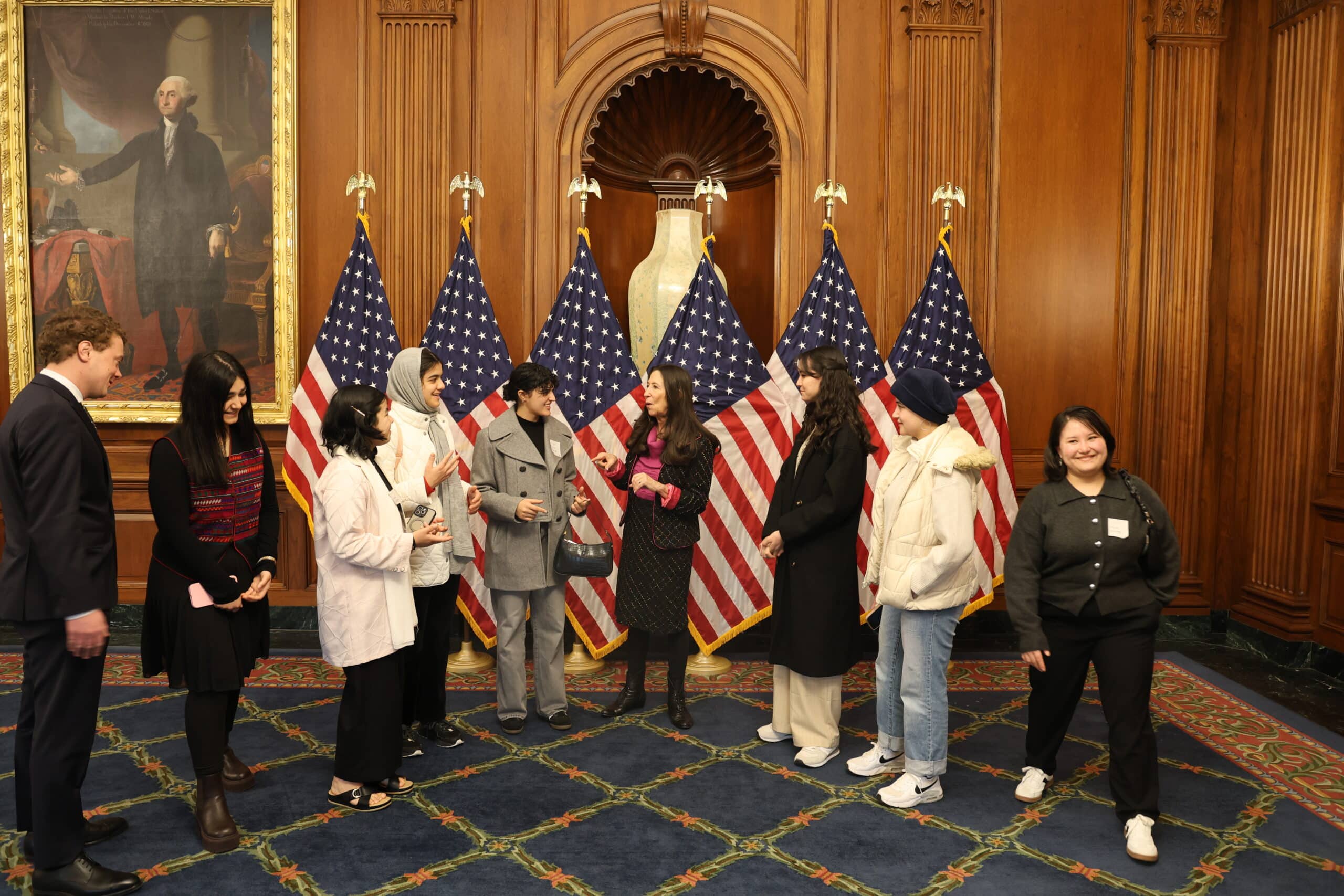 ASRF students in conversation with Representative Theresa Leger Fernandez in the Rayburn Room of the Capitol