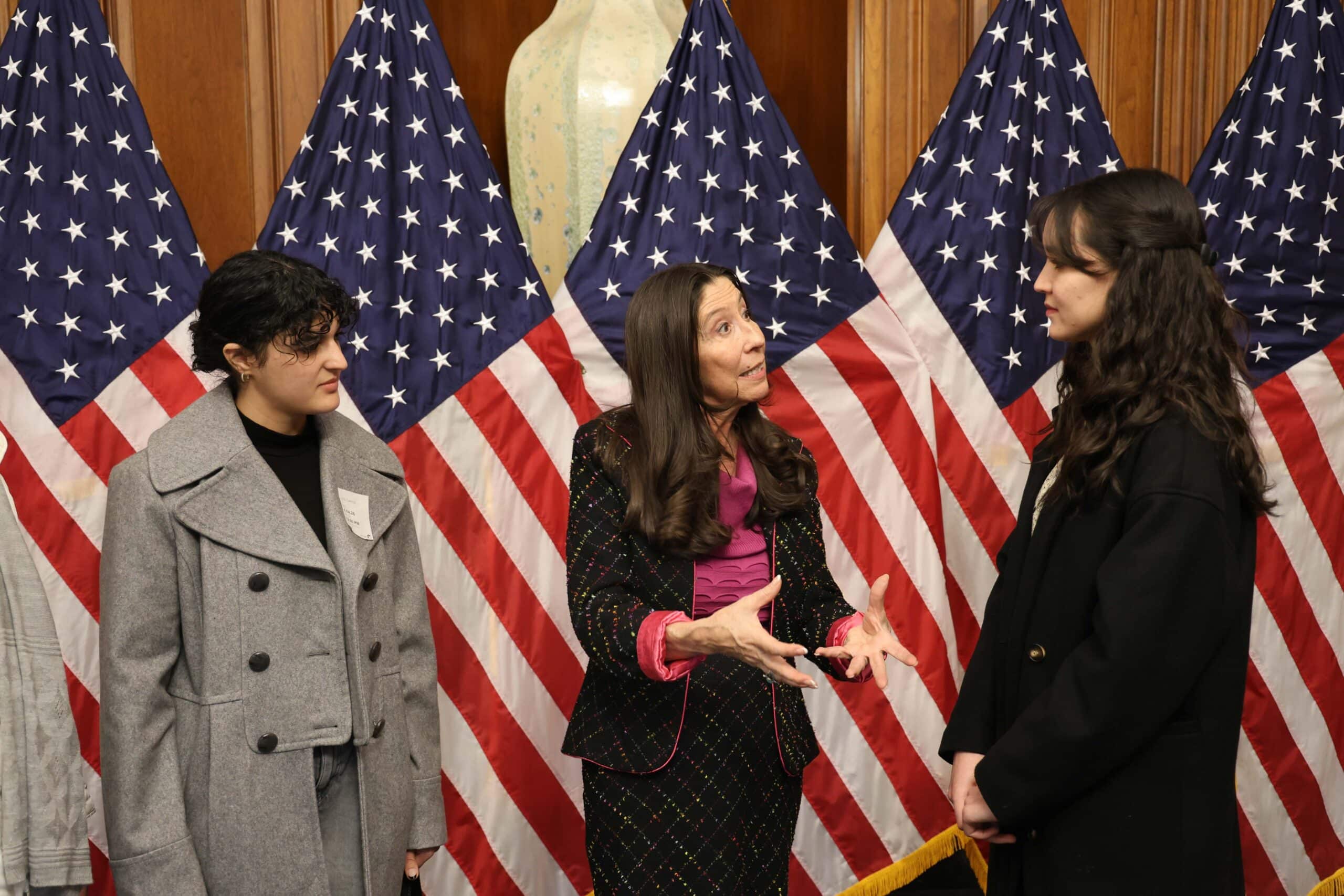 Sahar and Safa standing with Representative Theresa Leger Fernandez
