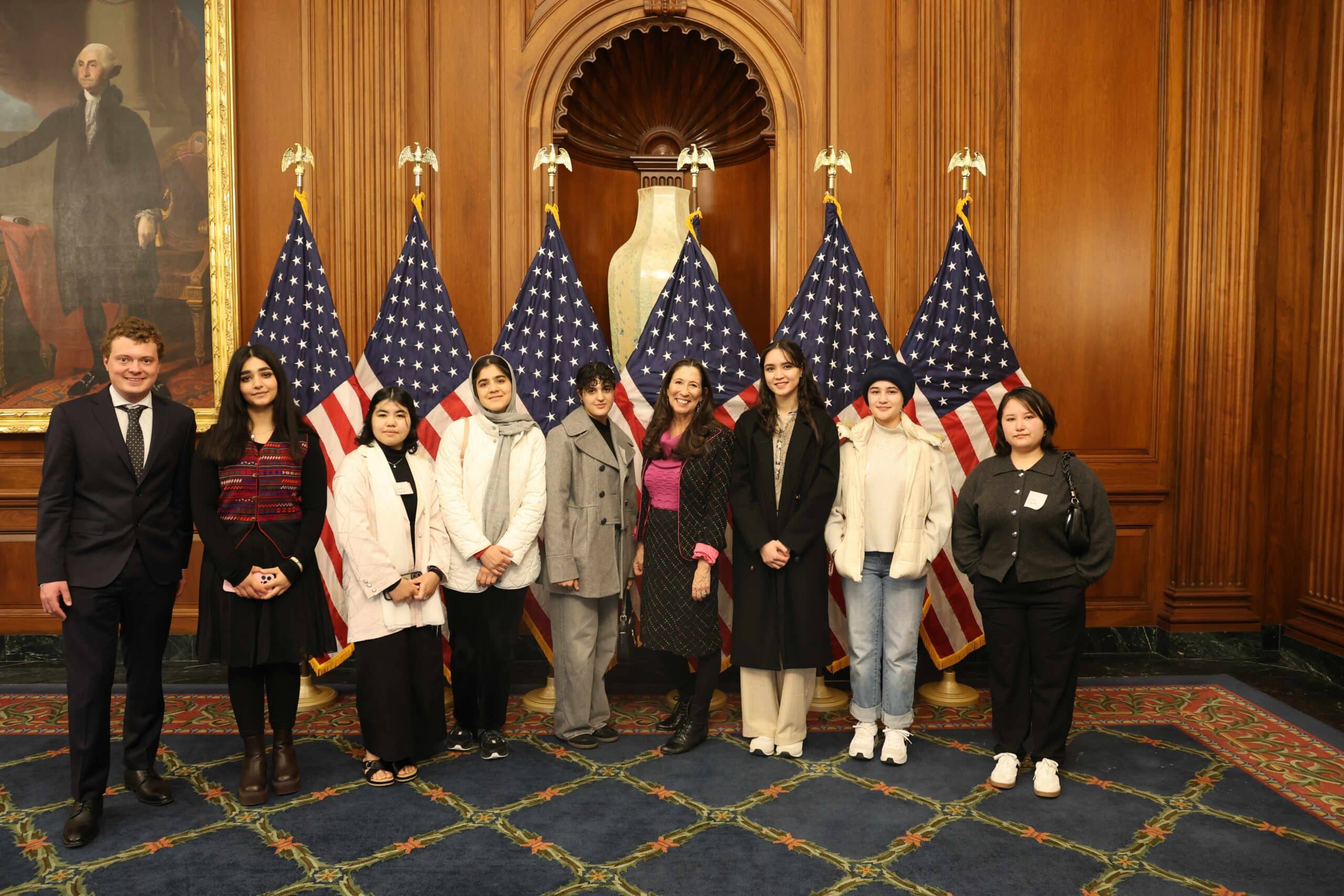ASRF students standing with Representative Theresa Leger Fernandez