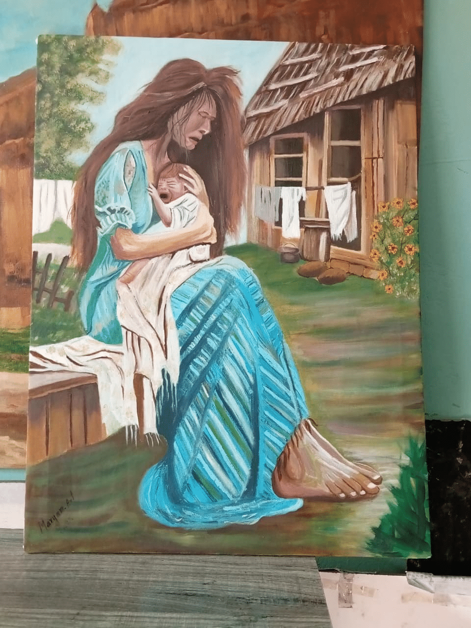 Painting of a mother in a blue dress cradling a baby outside a wooden cottage
